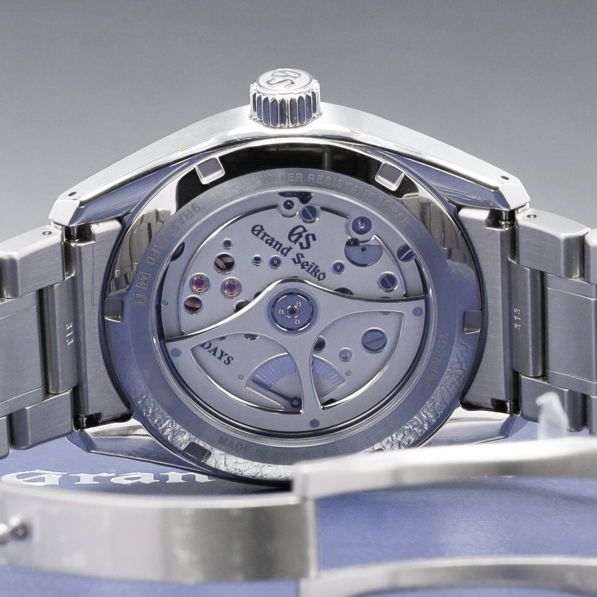 Grand Seiko Evolution 9 Collection 2026 Complete 40mm High Intensity Titanium Blue Lake Suwa Textured Dial High Intensity Titanium Fixed Bezel High-Intensity Titanium Bracelet with Folding Clasp SLGA019G