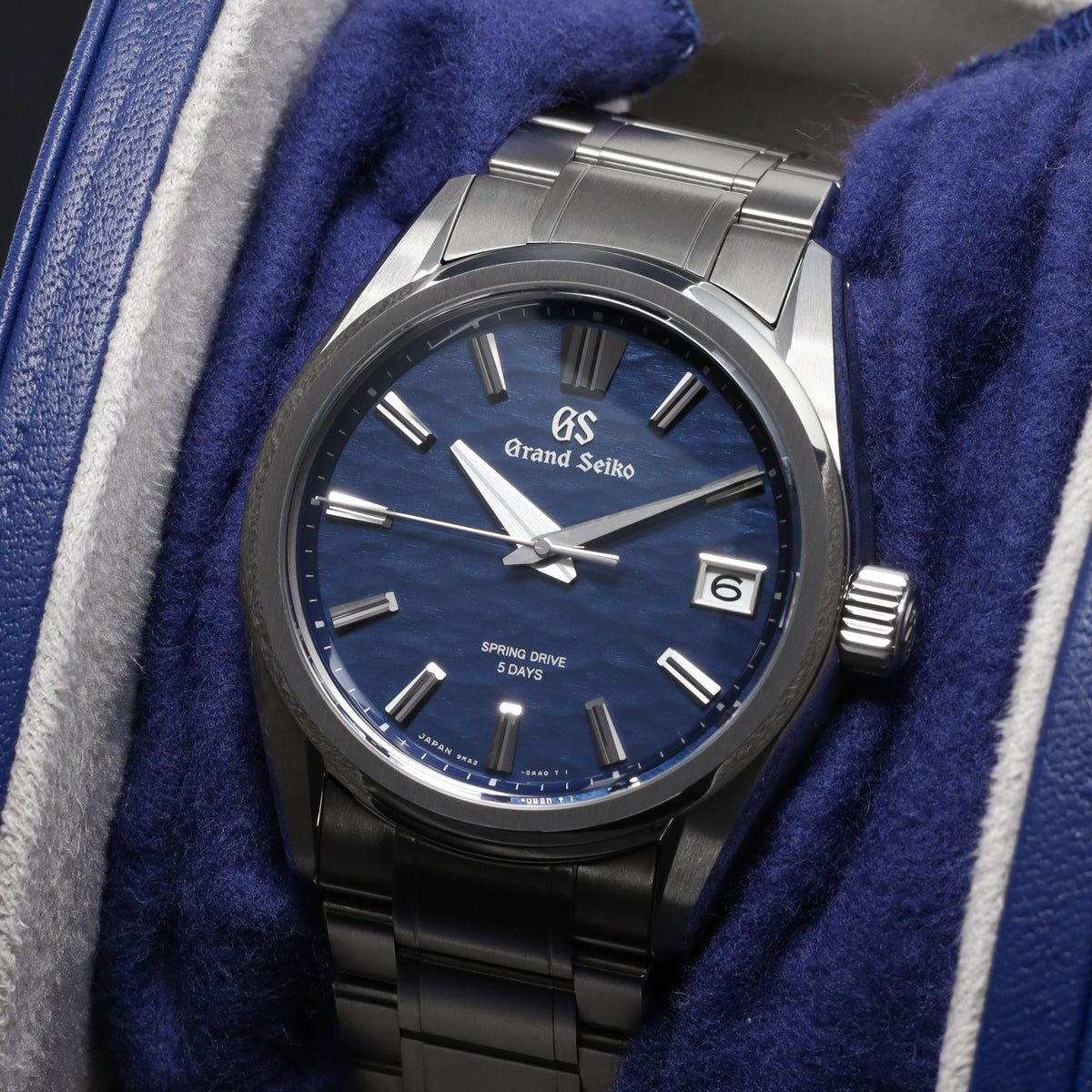 Grand Seiko Evolution 9 Collection 2026 Complete 40mm High Intensity Titanium Blue Lake Suwa Textured Dial High Intensity Titanium Fixed Bezel High-Intensity Titanium Bracelet with Folding Clasp SLGA019G