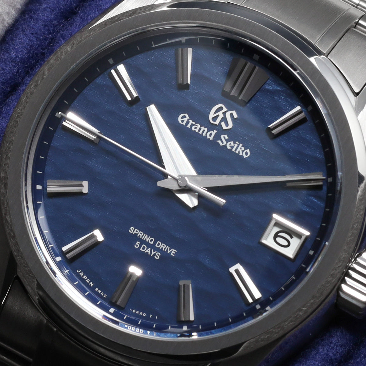 Grand Seiko Evolution 9 Collection 2026 Complete 40mm High Intensity Titanium Blue Lake Suwa Textured Dial High Intensity Titanium Fixed Bezel High-Intensity Titanium Bracelet with Folding Clasp SLGA019G
