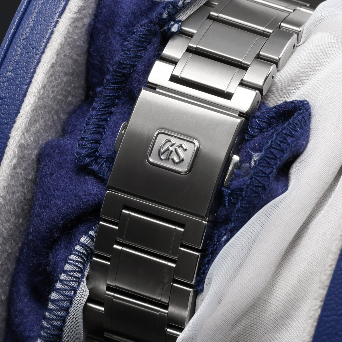 Grand Seiko Evolution 9 Collection 2026 Complete 40mm High Intensity Titanium Blue Lake Suwa Textured Dial High Intensity Titanium Fixed Bezel High-Intensity Titanium Bracelet with Folding Clasp SLGA019G