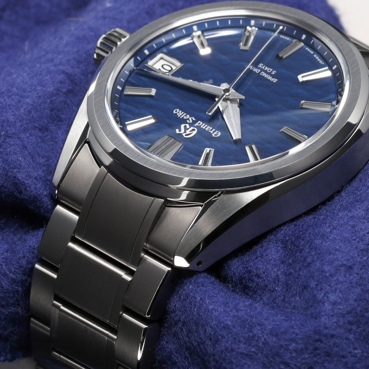 Grand Seiko Evolution 9 Collection 2026 Complete 40mm High Intensity Titanium Blue Lake Suwa Textured Dial High Intensity Titanium Fixed Bezel High-Intensity Titanium Bracelet with Folding Clasp SLGA019G