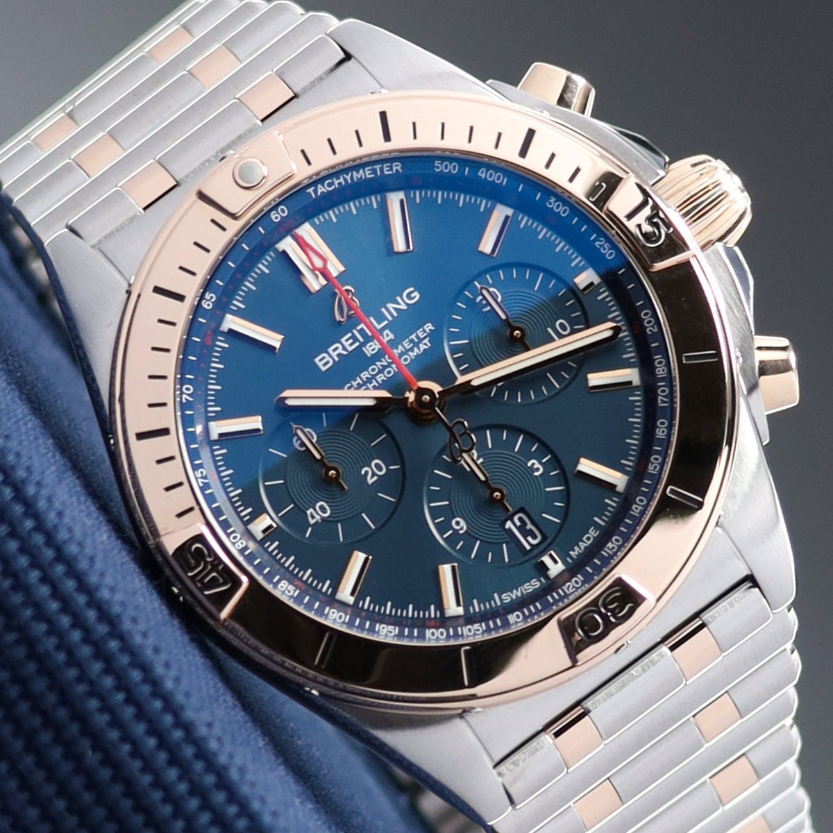 Breitling Chronomat 42mm Stainless Steel Blue Dial Rose Gold Bezel Two Tone Rouleaux Bracelet UB0134