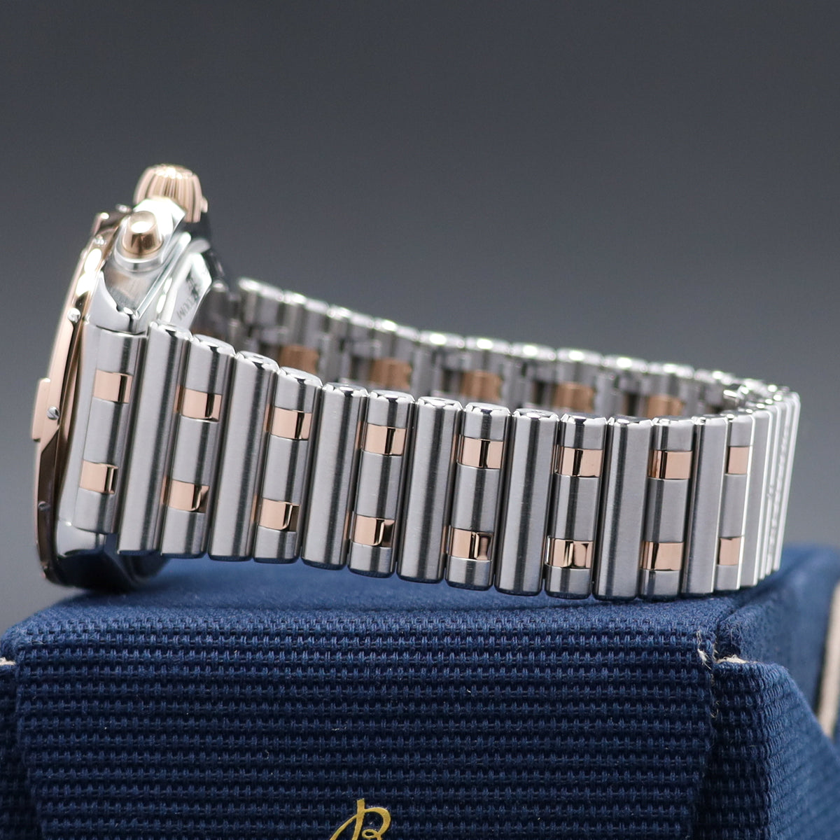 Breitling Chronomat 42mm Stainless Steel Blue Dial Rose Gold Bezel Two Tone Rouleaux Bracelet UB0134