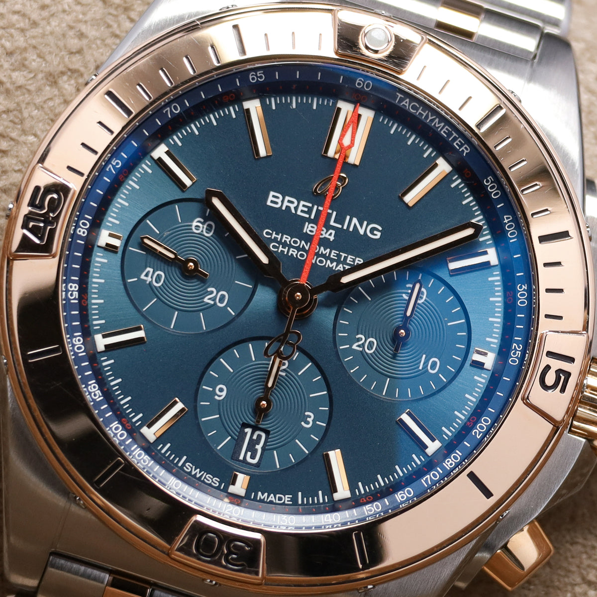 Breitling Chronomat 42mm Stainless Steel Blue Dial Rose Gold Bezel Two Tone Rouleaux Bracelet UB0134
