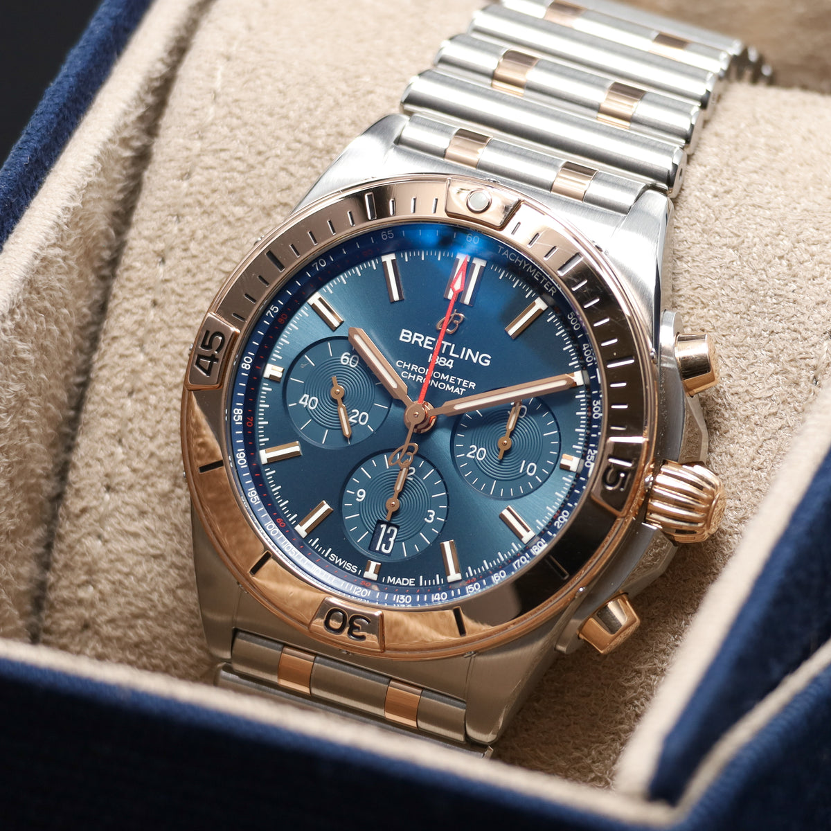 Breitling Chronomat 42mm Stainless Steel Blue Dial Rose Gold Bezel Two Tone Rouleaux Bracelet UB0134