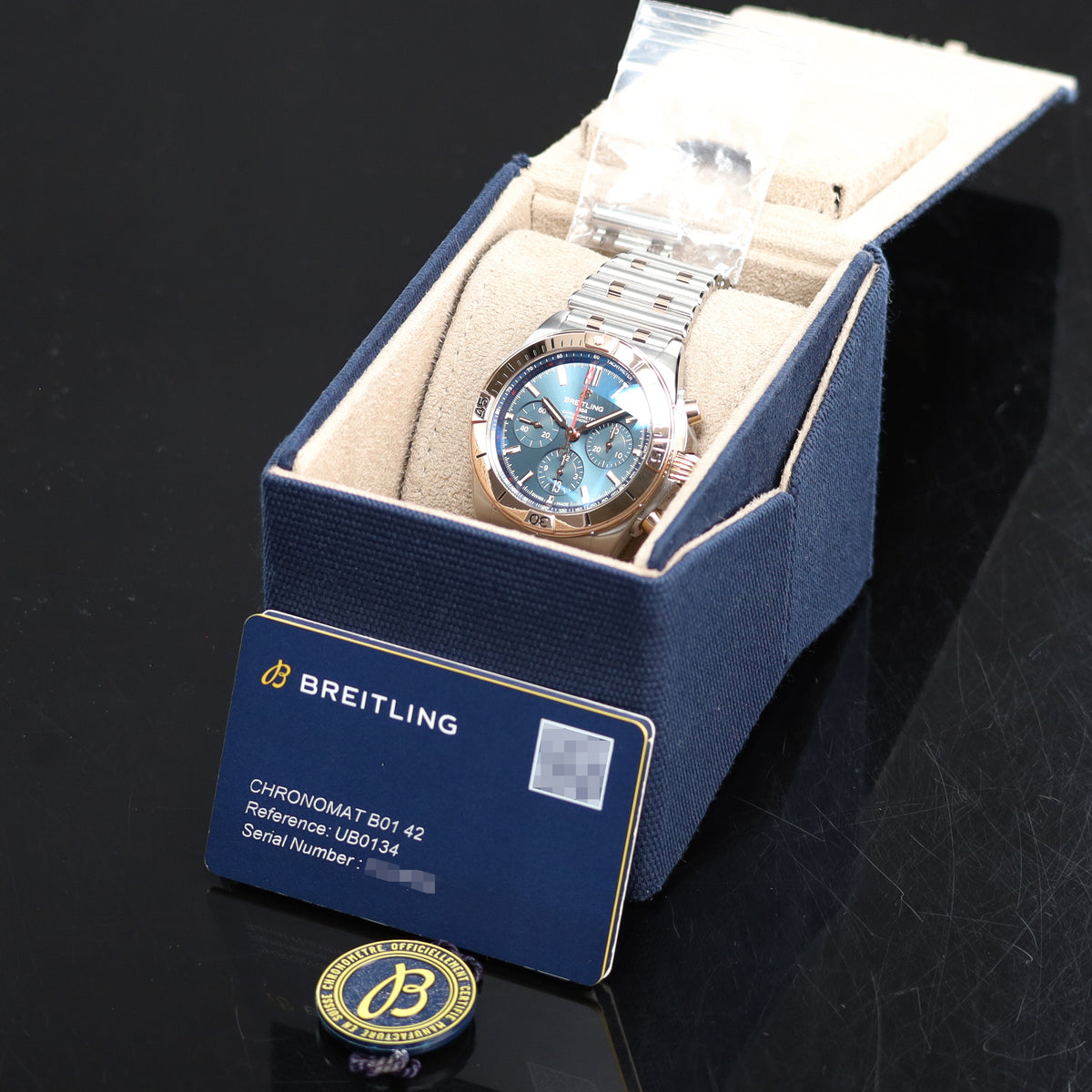 Breitling Chronomat 42mm Stainless Steel Blue Dial Rose Gold Bezel Two Tone Rouleaux Bracelet UB0134