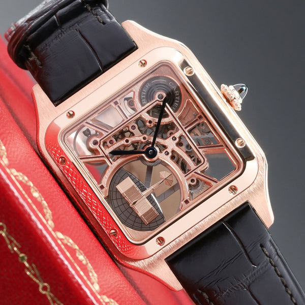 Cartier Santos Dumont 2024 Complete 31.4mm 18k Rose Gold Skeletonized with Burgundy Lacquered Bridges Dial 18k Rose Gold Bezel Burgundy Alligator Leather Strap with Additional Brown Alligator Strap WHSA0030
